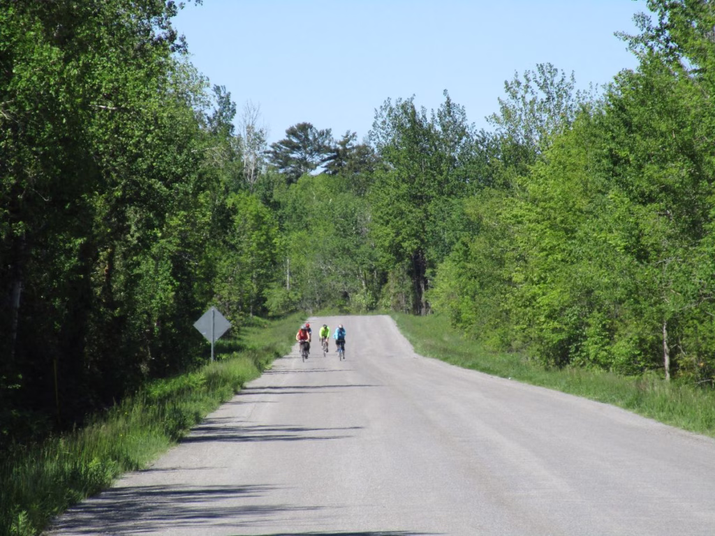 Cyclists on rural road between Cobourg