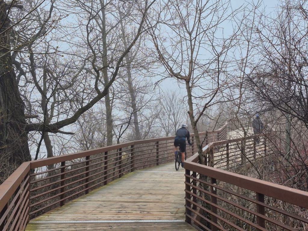 Cyclist on the bridge crossing Duffins Creek in Ajax, Ontario