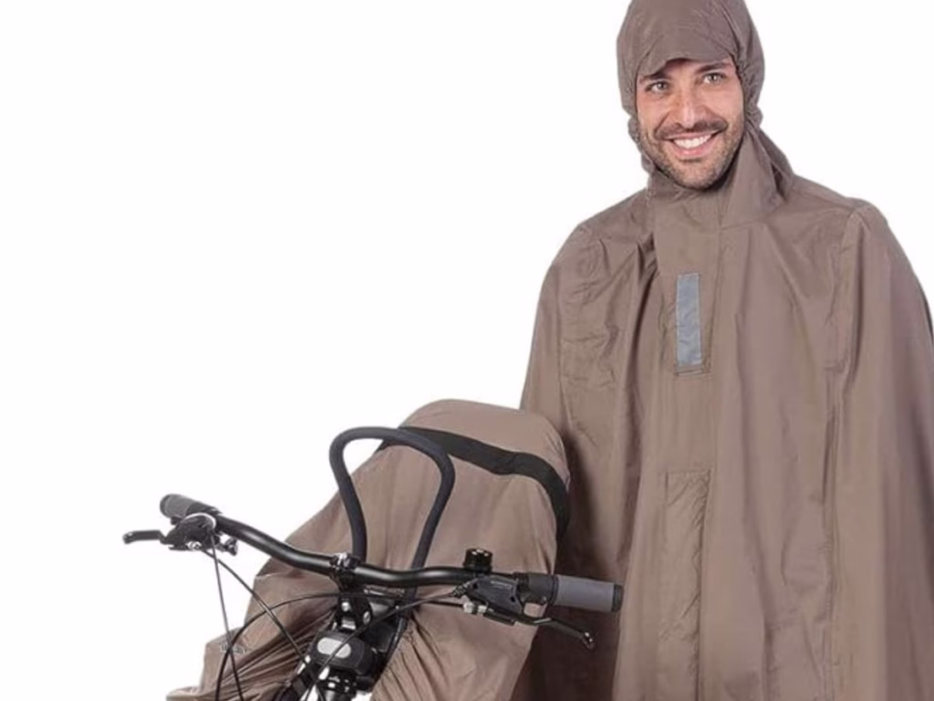 Brown Tucano Urbano Cycling Rain Cape with a front bike seat cover